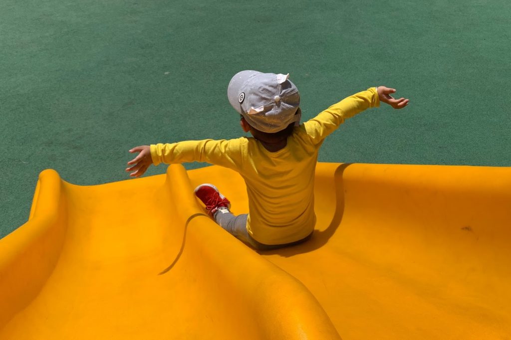 a child going down a slide