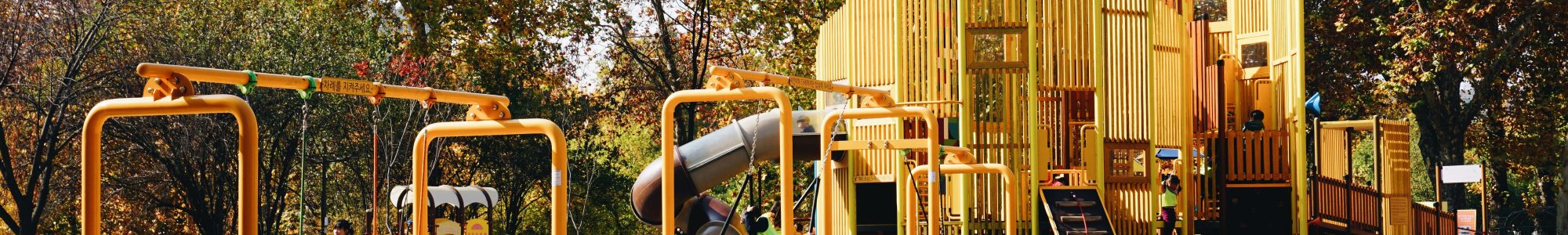 A large playground with two different surfaces.