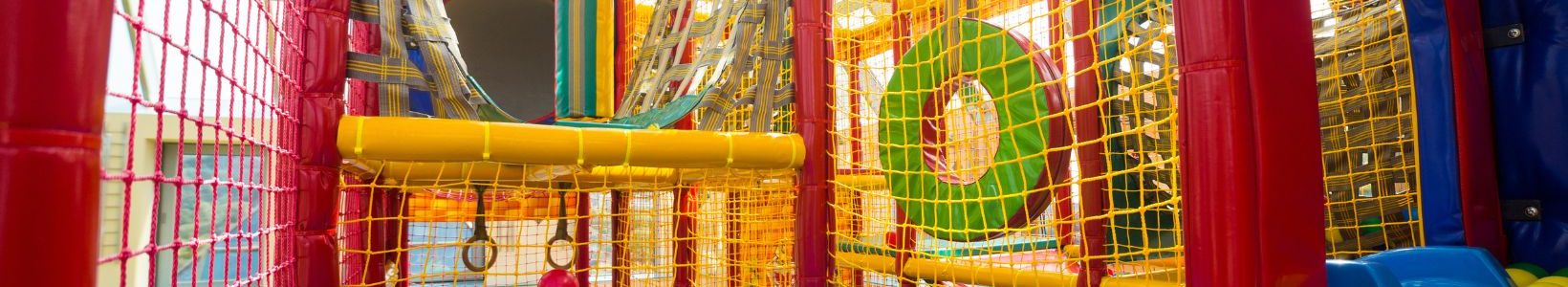 The inside of a colourful indoor playground.