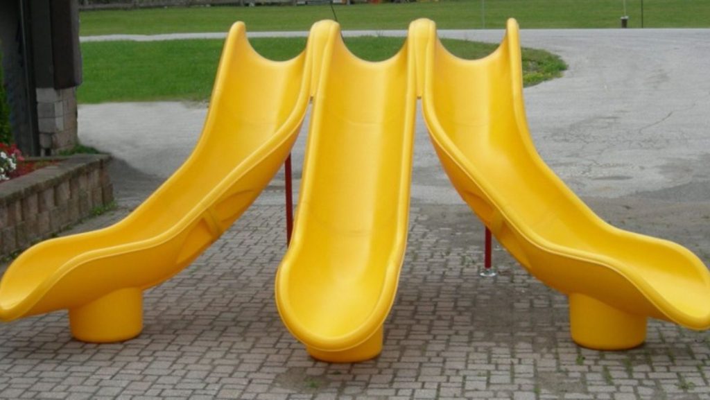 Yellow custom plastic slide made using custom rotational molding