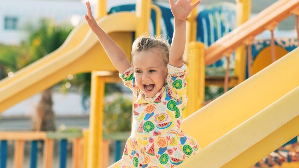 Child playing on a outdoor playground