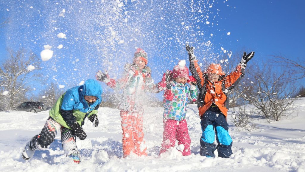 kids playing in the snow